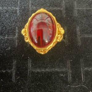 Opulent Gold and Red Gemstone Ring
